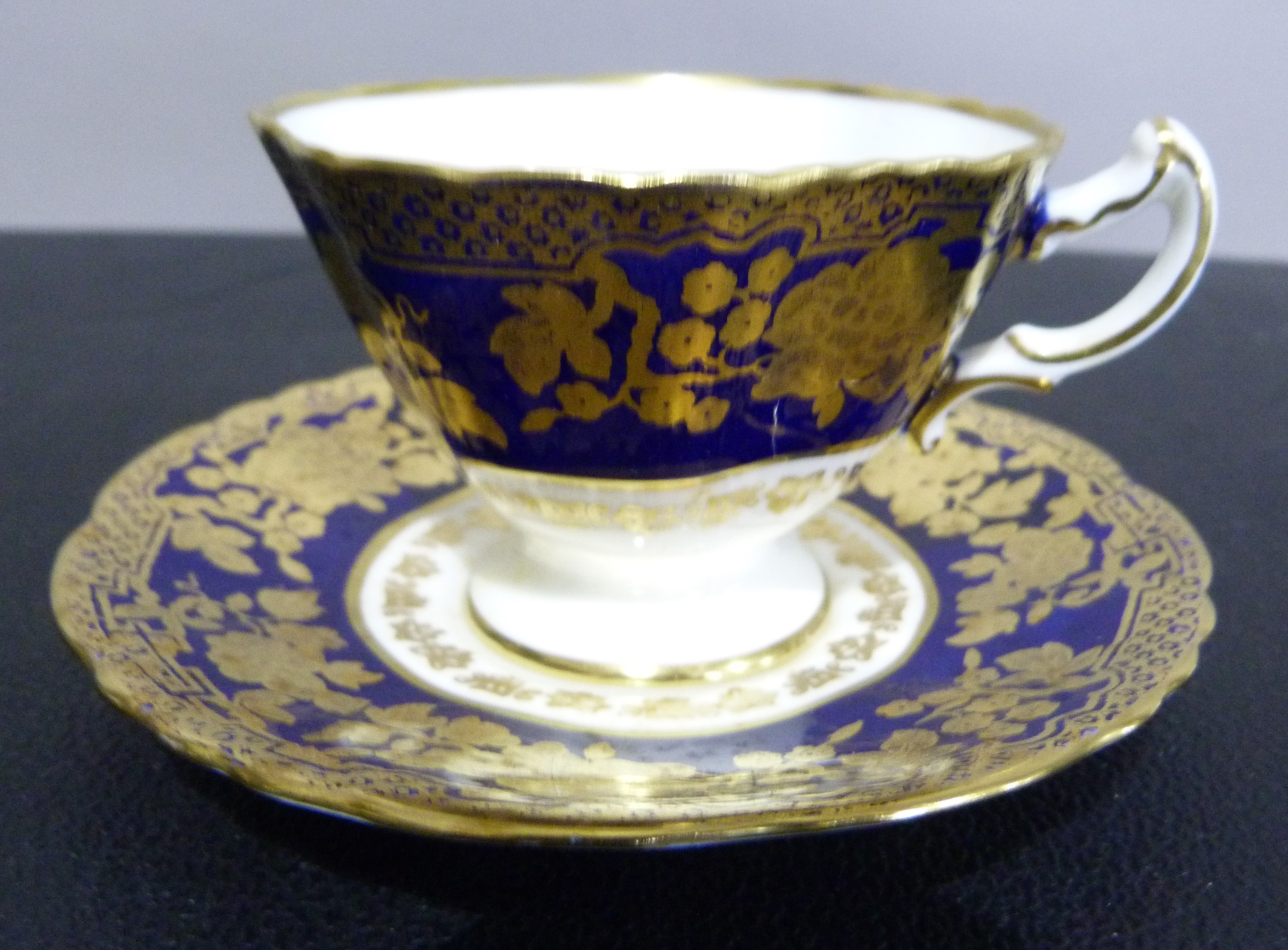A set of six Hammersley china tea cups and saucers decorated in dark blue and gilt on a white - Image 2 of 9