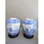 A pair of EPC, Stoke-on-Trent pottery ginger jars, decorated in underglaze blue with chinoiserie