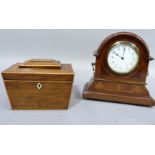 A nineteenth century mahogany and boxwood lined inlaid tea caddy of sarcophagus shape, width 17.