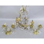 A brass, moulded and cut glass chandelier and pair of two branch wall brackets