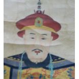 A Japanese scroll printed and painted with a portrait of an Emperor in fine robes