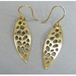 A pair of pierced leaf earrings in yellow metal (tests as 14ct gold) on French earrings, total