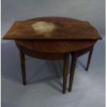 A George III mahogany extending dining table with pair of D- Shaped ends, deep friezes with