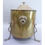 An Art Noveau brass fuel bin with domed top with compressed ball and spire finial, the cylindrical