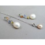 A pair of fresh water cultured pearls and multi stone ear pendants in 18ct white gold, the 8mm