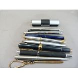 A selection of pens including a Parker biro and retractable pencil, other makes and a pocket