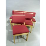 A set of six beech framed single chairs upholstered in crimson to the back and seat, each with a