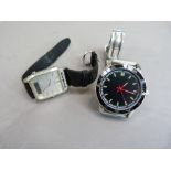 A 1960's Portuguese colonial style wrist watch in chromed case, quartz motif with green batons and