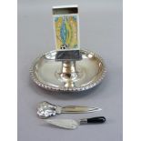 A Messrs Bryant and May Limited silver plated ashtray and matchbox stand, circular with reel
