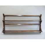 An Ercol plate rack, 50cm high x 97cm wide