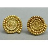 A pair of ear studs in 18ct gold, each a graduated, beaded spiral, total approx weight 4.7gm