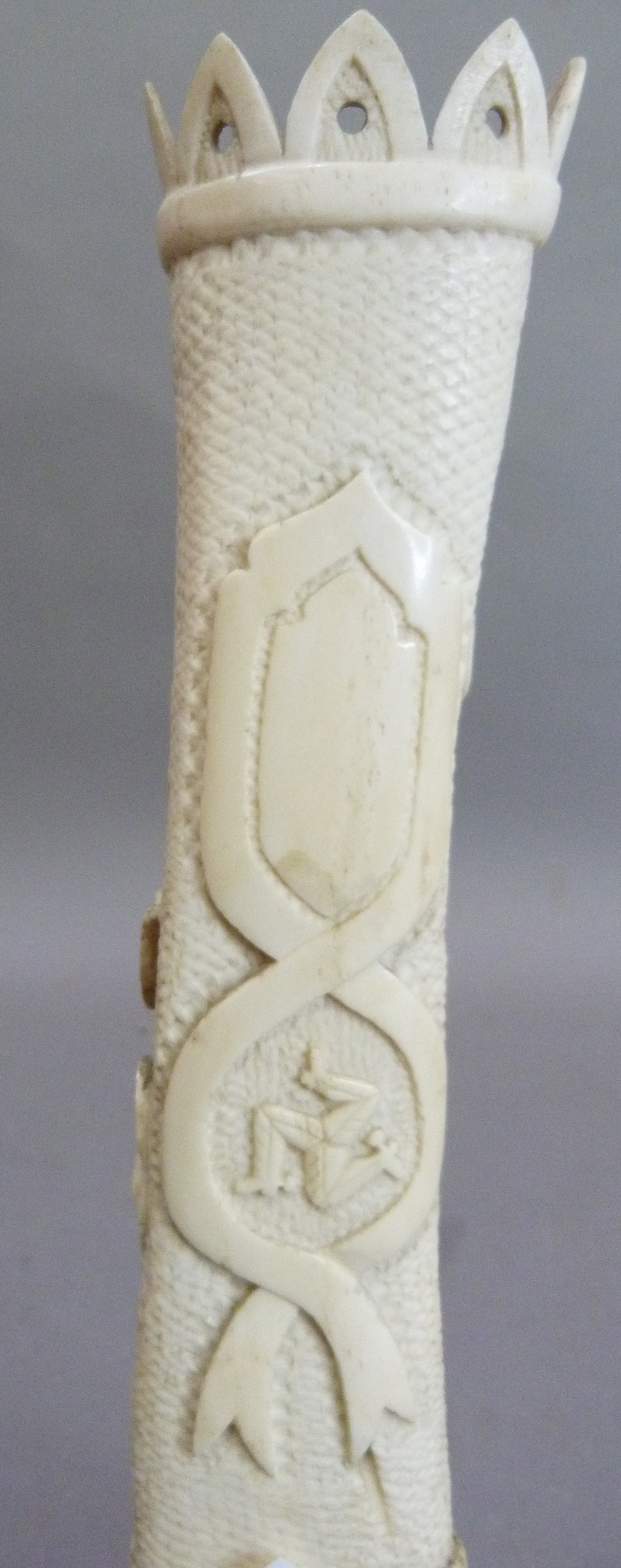 A bone carving of a castle turret with rose briar, the reverse with cartouche and Isle of Man - Image 2 of 3