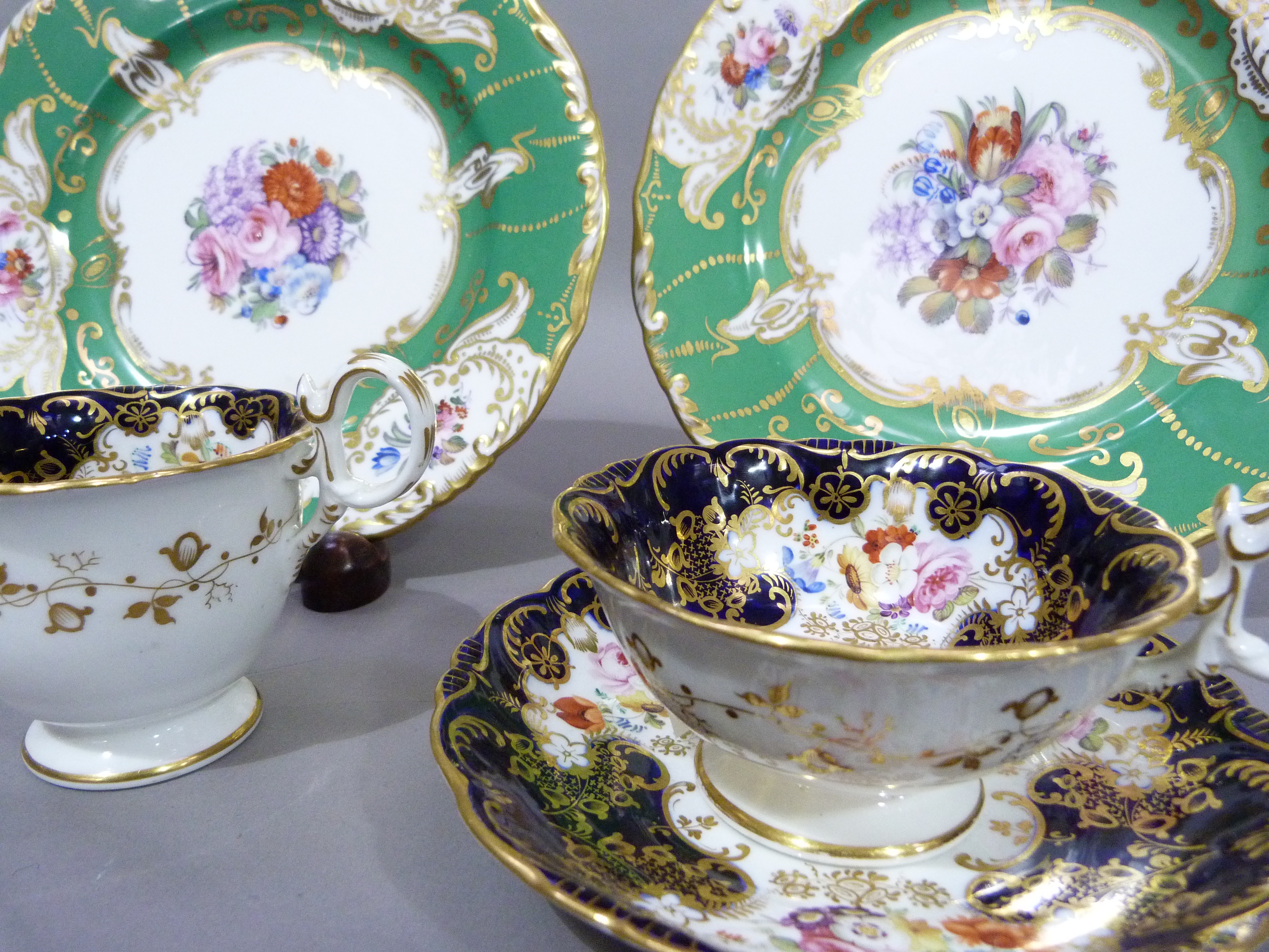 A mid nineteenth century English china trio of two cups and saucer, polychrome enamelled with sprays - Image 4 of 4