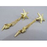 A pair of 'Seaside Chique' ear pendants in 18ct gold, each as a star fish with small shells hung