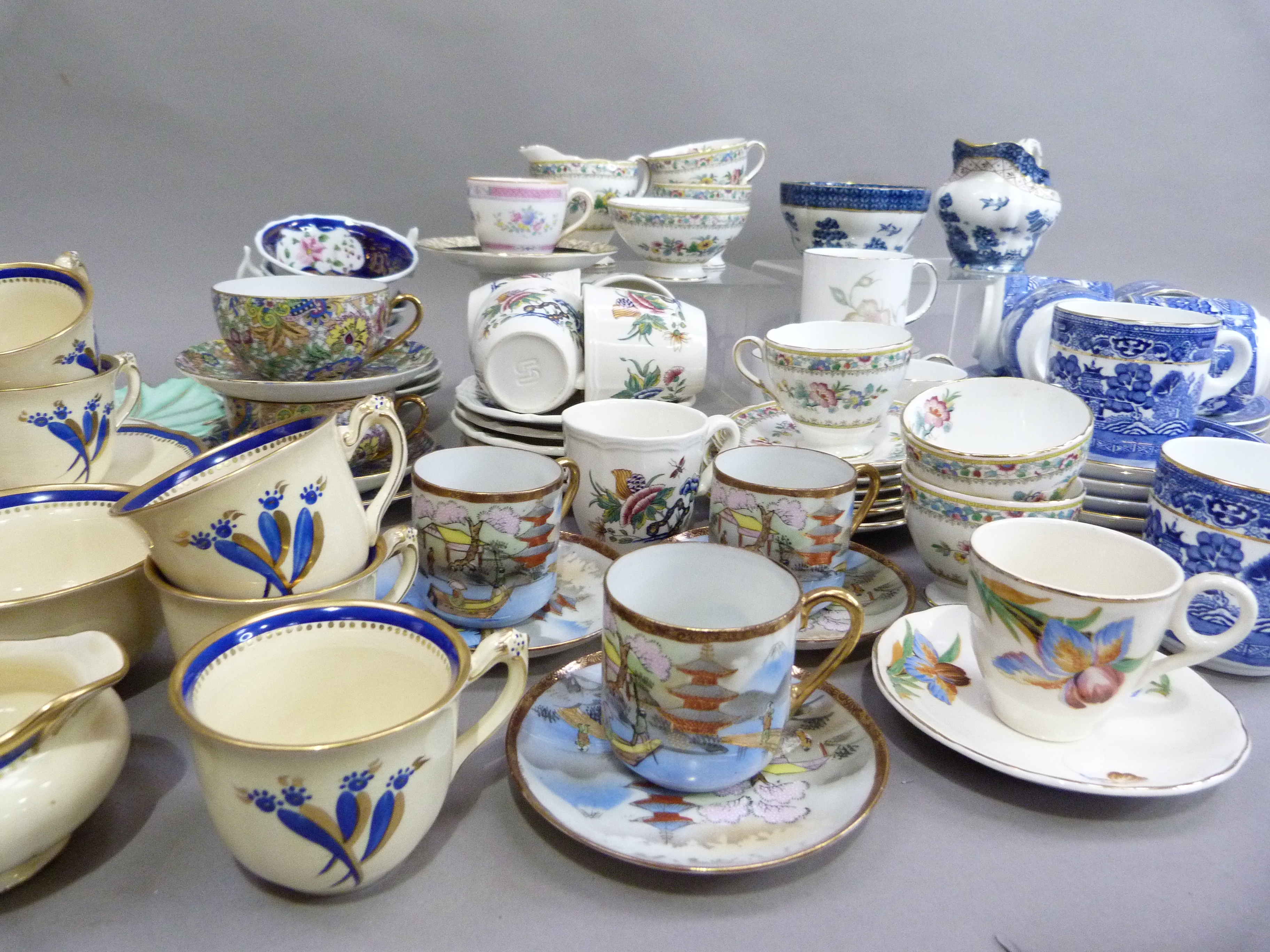 A Sutherland china, blue and white willow pattern tea service of six cups, six saucers, six tea - Image 3 of 3