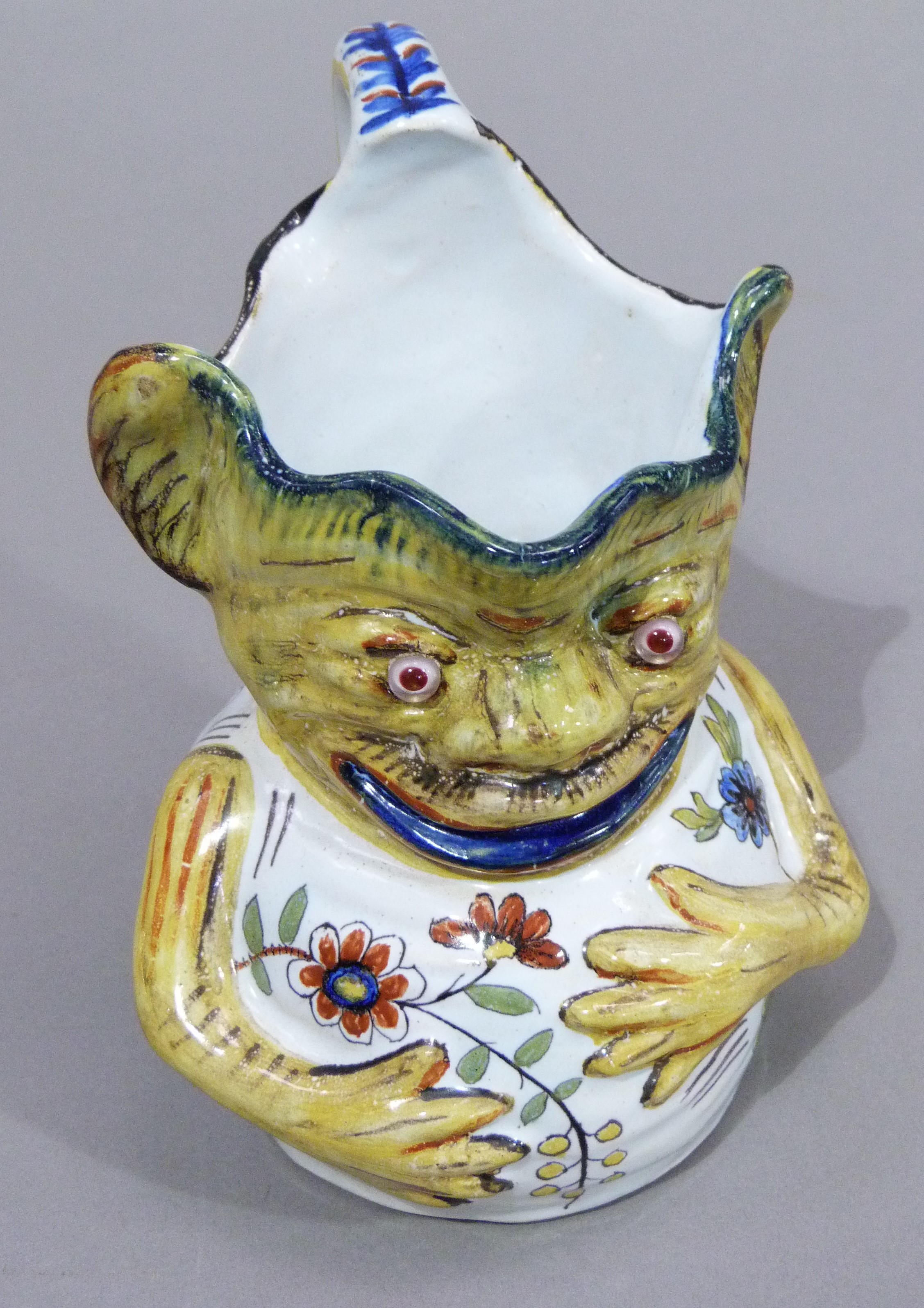 A Rouen faience grotesque face mask jug, marked to underside, 15cm - Image 5 of 5