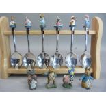 A set of late twentieth century silver plated Beatrix Potter teaspoons, each with a character