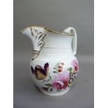 A 19th century English china jug polychrome enamelled with peony, tulips and other flowers