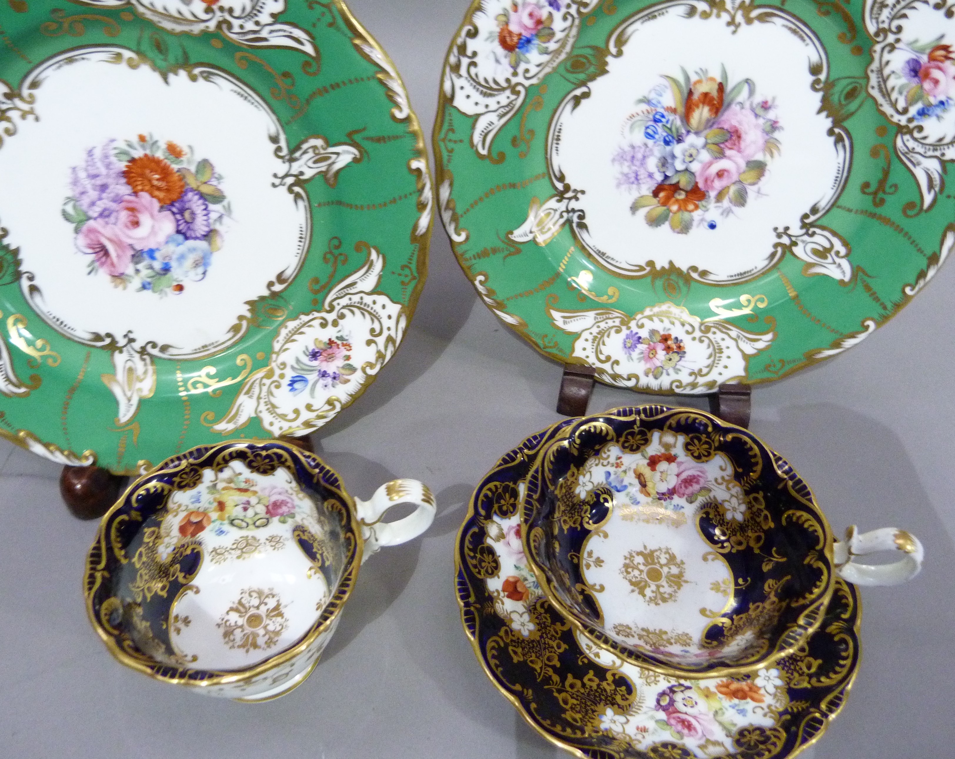 A mid nineteenth century English china trio of two cups and saucer, polychrome enamelled with sprays - Image 2 of 4
