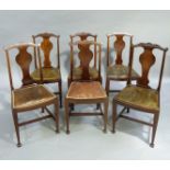 A set of six mahogany dining chairs of Queen Anne style having a vase shaped splat, upholstered seat