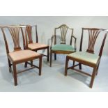 Three early 20th century mahogany Hepplewhite dining chairs with pierced splats, upholstered drop in