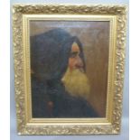 E.C.G late 19th/early 20th century, head and shoulder study of a bearded man wearing a hooded cloak,