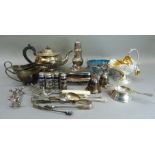 A quantity of miscellaneous silver plated ware including teapot two sauceboats sugar scuttle tea