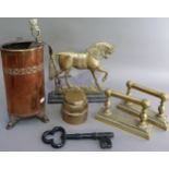 A pair of Victorian fire dogs of post and rail construction with rectangular bases, a door porter