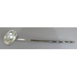 An C18th silver toddy ladle on a twisted baleen handle, London hallmark with duty head, marks rubbed