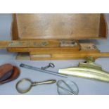 A vintage oak filing tray by Globe together with a multi-tier pencil case, a brass paperclip,