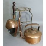 A late Victorian copper tripod trivet, 31cm high, together with a circular copper kettle, 20cm