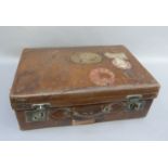 An early 20th century gentleman's leather suitcase, tan leather lined and fitted with silver
