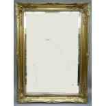 A gilt framed wall mirror, 65cm x 90cm