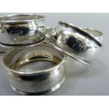 A set of six silver napkin rings, each engraved with the initial 'H', Chester 1901