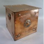 A good copper coal box of square outline having a Yorkshire rose and a boss to each corner on the
