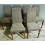 A set of six modern dining chairs upholstered in brown flat weave and on square tapered legs