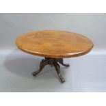 A Victorian walnut veneered oval looe table, the quartered top centred on inlaid lozenge, boxwood
