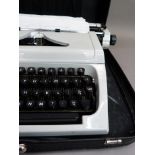 An Erika manual typewriter in carrying case