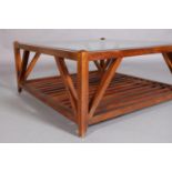 A hardwood and glass inset coffee table, square, with railed undertier, on stile feet, 100cm