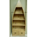 A reproduction 'boat' bookcase with three shelves and pair of deep drawers, 205cm high x 77cm high