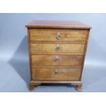 A mahogany chest of drawers in George III style, the rectangular top parquetry strung above four