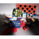 A quantity of games including cards, dominos, Rubix Cube, five Dycast vehicles (modern) games