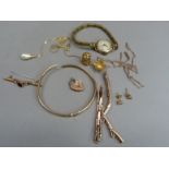 A small quantity of 9ct gold scrap and yellow metal jewellery (a/f), tests as 9ct gold, total