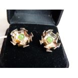 A pair of chrysoprase set ear studs in abstract foliate silver gilt, approx diameter 17mm;