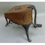 A Victorian patent bellows on a cast iron stand with foot pump by Fletcher Russell and Co Limited,