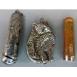 A 9ct gold tipped cheroot holder and a silver case with all over engraved with leaves and