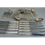 A part suite of silver plated cutlery of Kings pattern comprising 2 serving spoons, 6 dessert