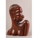 HAGENAUER - a mahogany head and shoulder carved bust if a female, indistinctly inscribed to the base