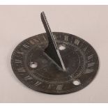 OF GARDENING INTEREST: A MID 18TH CENTURY BRONZE SUN DIAL, circular, engraved with the points of the