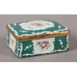 A 19TH CENTURY GERMAN ENAMEL BOX, rectangular, the cover and sides painted with delicate floral